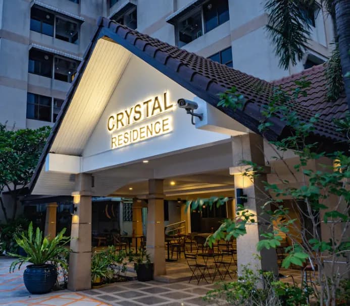 Crystal Resort & Cafe entrance at dusk